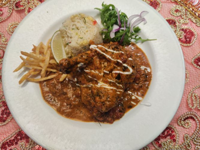 tandoori breast of guinea fowl. served with egg rice.