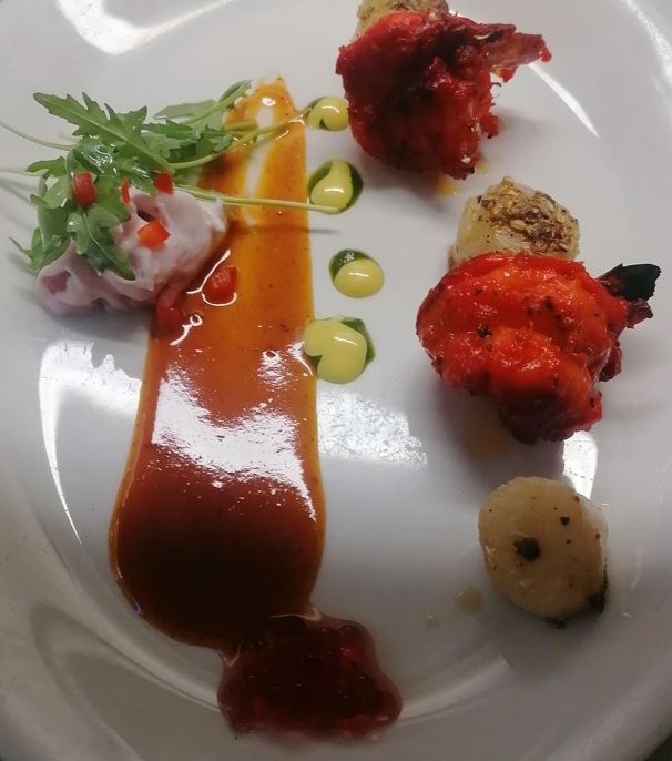 tandoor king prawn with spiced scallops and raspberry caviar