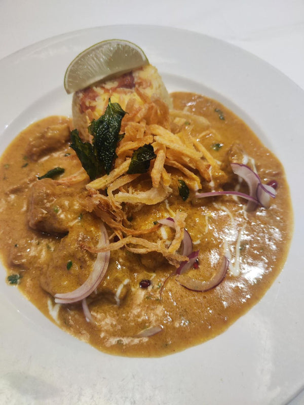 slow cooked organic lamb neck. served with saffron rice.