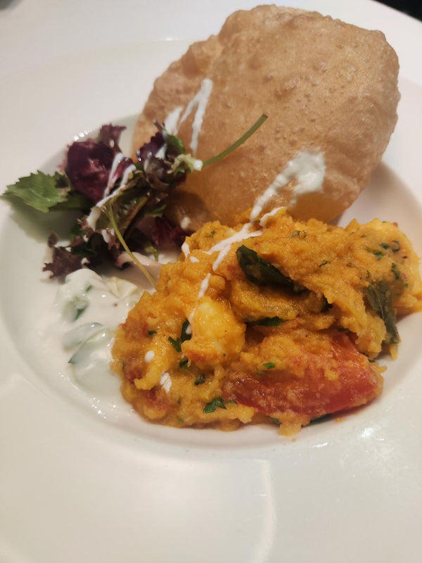 coconut vinegar poached king prawns