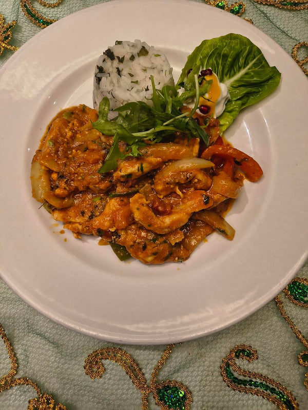Piyaza Chicken-strips of corn fed chicken breast in jalfrezi style sauce. served with herbed rice.